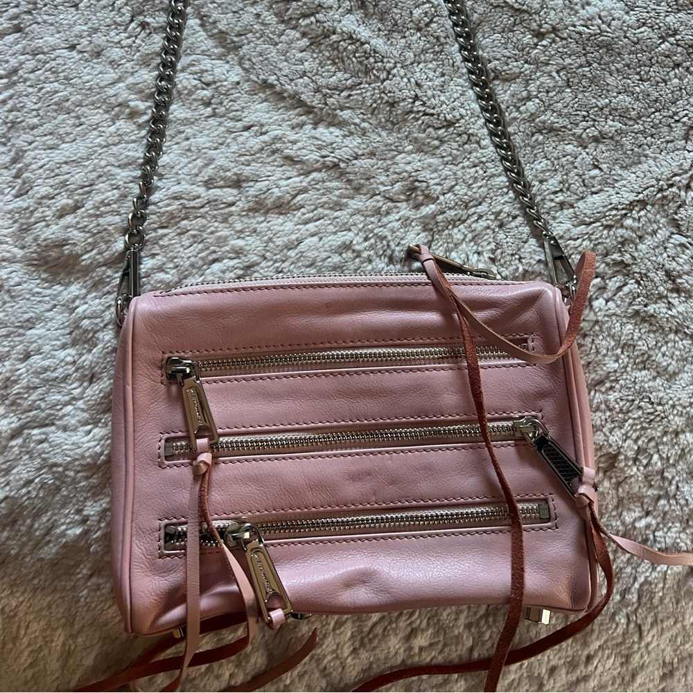 Rebecca Minkoff Pale Pink Crossbody with multiple zipper design.